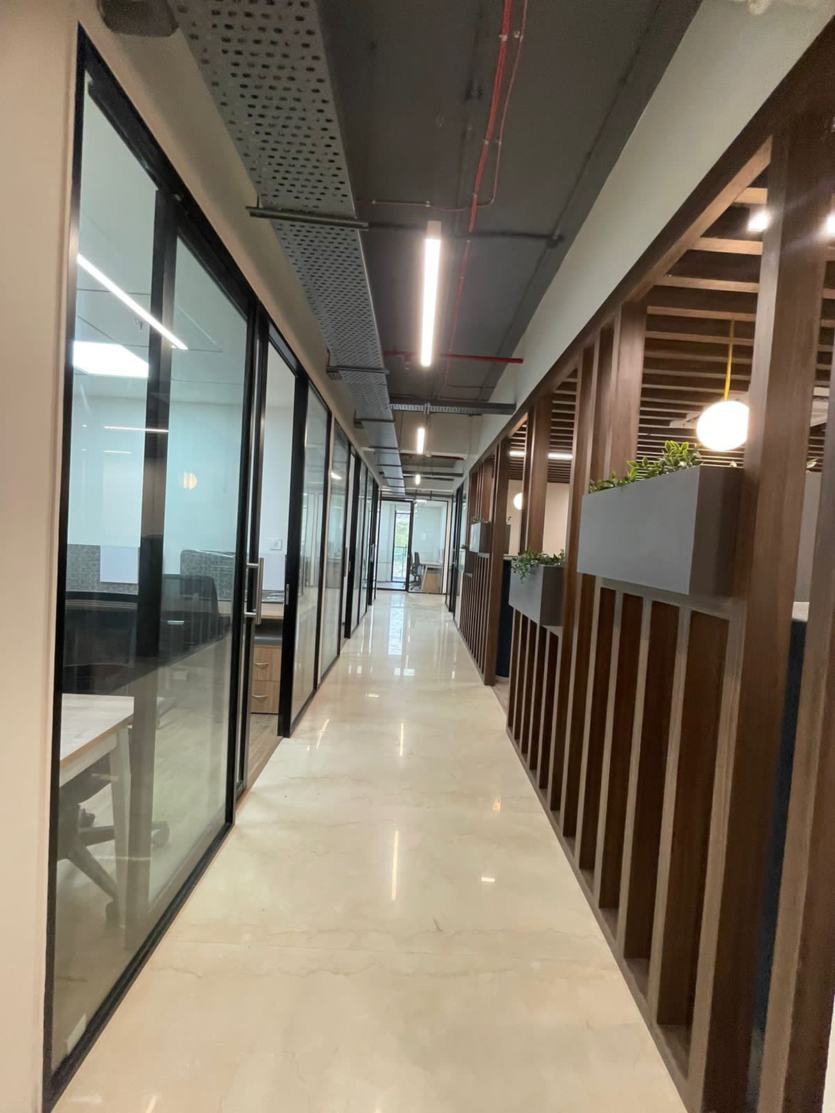 Transforming Office Spaces: How Sleek Glass Partitions Revolutionize Pune Workplaces | Satyam enterprises
