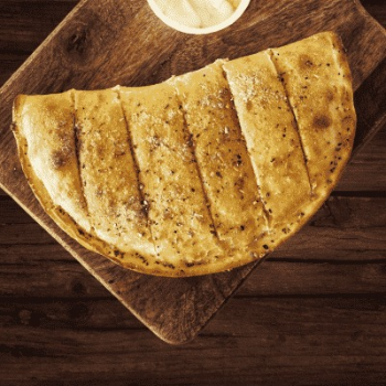 Savoring Togetherness: How Paneer Tikka Stuffed Garlic Bread Brings Families Closer