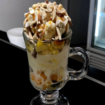 A Sweet Escape: How Fruit Salad with Ice Cream Brings Families Together | LATHA THE MULTICUISINE FAMILY RESTAURANT