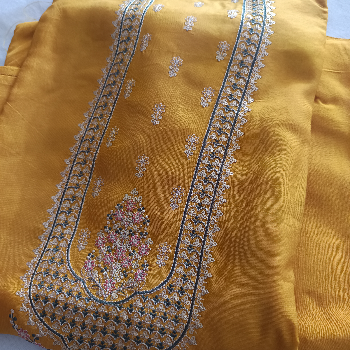 Transform Your Wardrobe: Discover the Magic of Ethnic Heavy Work Unstitched Suits | VANATI