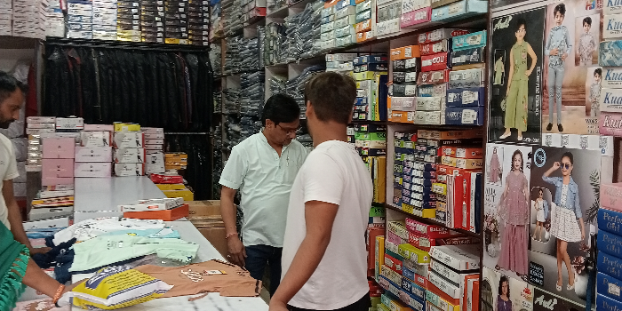 Banner POOJA MATCHING CENTRE AND KIDS WEAR