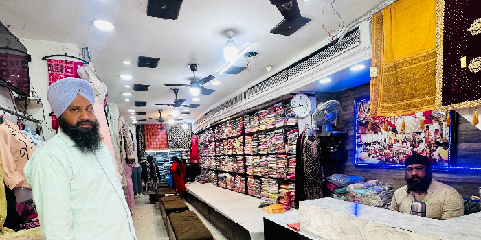 Banner DAVINDER READYMADE GARMENTS