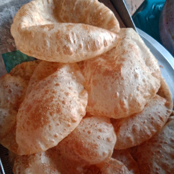 Tiffin(Poori)-https://media.vyaparify.com/vcards/products/138688/product_1739279902_67ab4e1e37ac4.png Image