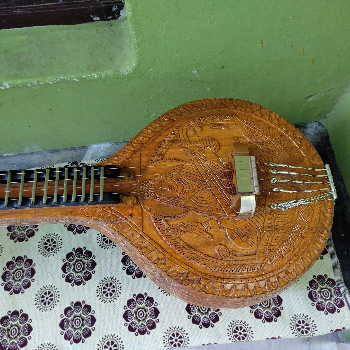 Saraswati joint carving veena-https://media.vyaparify.com/vcards/products/152153/product_1740732614_67c178c6bc521.png Image