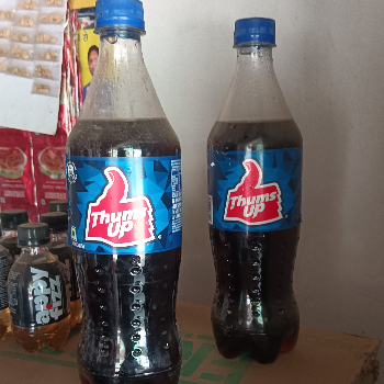 Thams up-https://media.vyaparify.com/vcards/products/163530/product_1741847901_67d27d5d70a87.png Image