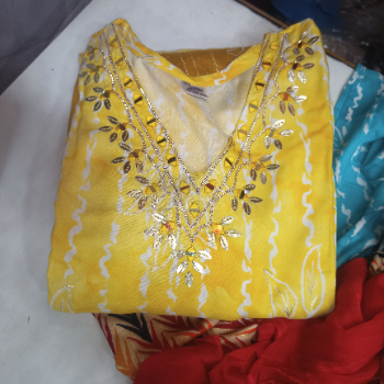 Ladies suit-https://media.vyaparify.com/vcards/products/183245/product_1744030973_67f3ccfd2b0af.png Image