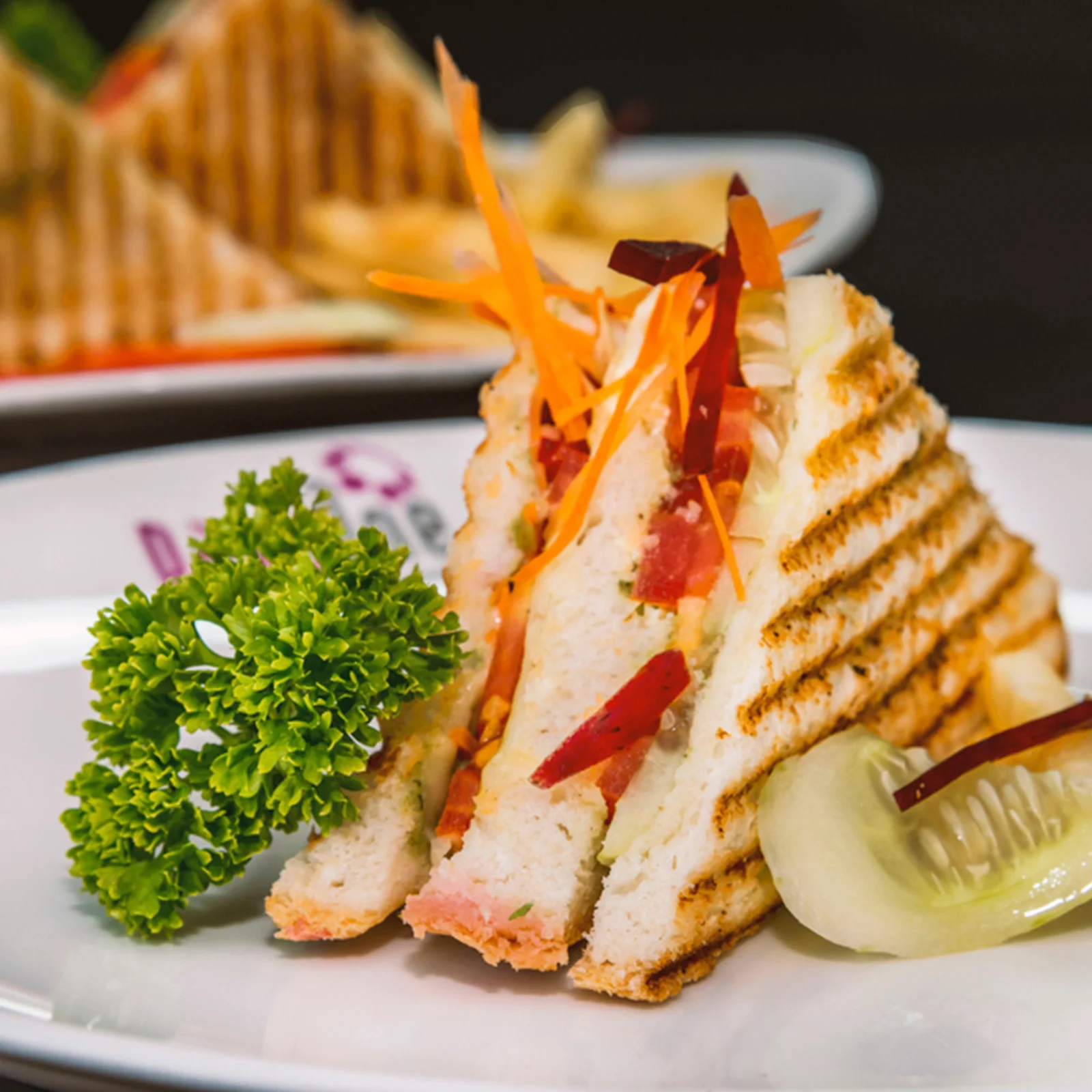 Variety of sandwiches-https://media.vyaparify.com/vcards/products/220413/product_1746811063_681e38b76d42b.png Image