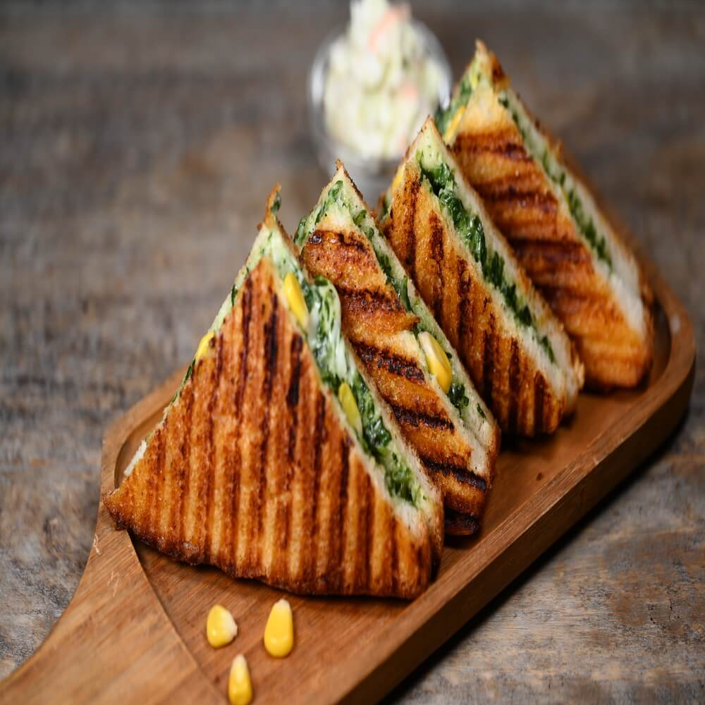 Variety of sandwiches-https://media.vyaparify.com/vcards/products/220417/product_1746811063_681e38b7eab11.png Image