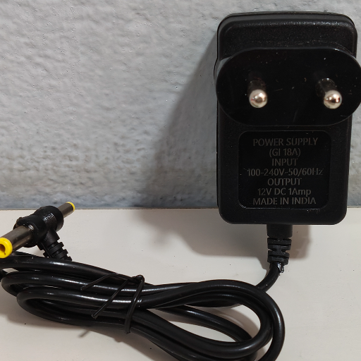 12V - 1A Adaptor-https://media.vyaparify.com/vcards/products/288024/product_1749712420_684a7e24af990.png Image