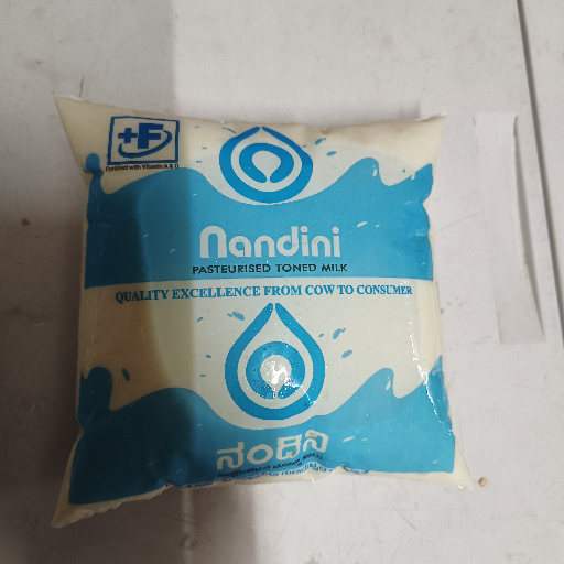 Nandini Toned Milk 500ml Pack-https://media.vyaparify.com/vcards/products/314797/product_1753459292_6883aa5ce8ae6.png Image