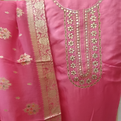 Unstitched Suits-https://media.vyaparify.com/vcards/products/350181/product_1757759720_68c548e874a05.png Image