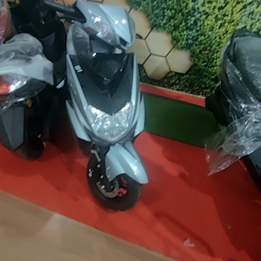 Electric scooty-https://media.vyaparify.com/vcards/products/362656/product_1758632095_68d2989f99e3b.png Image