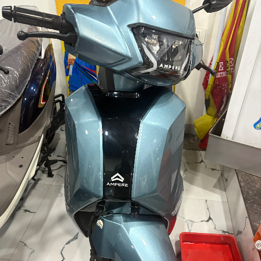 Ampere Electric scooter-https://media.vyaparify.com/vcards/products/378540/product_1760077583_68e8a70f6a7c1.png Image