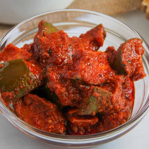 Mango Pickle-https://media.vyaparify.com/vcards/products/392058/product_1761290833_68fb2a515ae6b.png Image