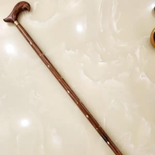 Wood stick with brass pices-https://media.vyaparify.com/vcards/products/401947/product_1762364124_690b8adcdbca0.png Image