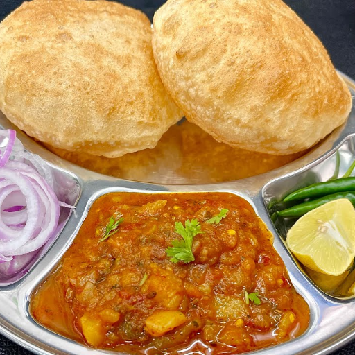 Puri bhaji-https://media.vyaparify.com/vcards/products/415566/product_1763371595_691aea4b5fc5e.png Image