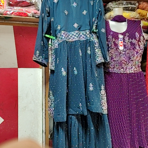 Suit-https://media.vyaparify.com/vcards/products/425557/product_1763974721_69241e4159b32.png Image