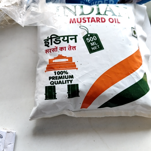 Mustard oil-https://media.vyaparify.com/vcards/products/429672/product_1764233454_692810ee1626e.png Image