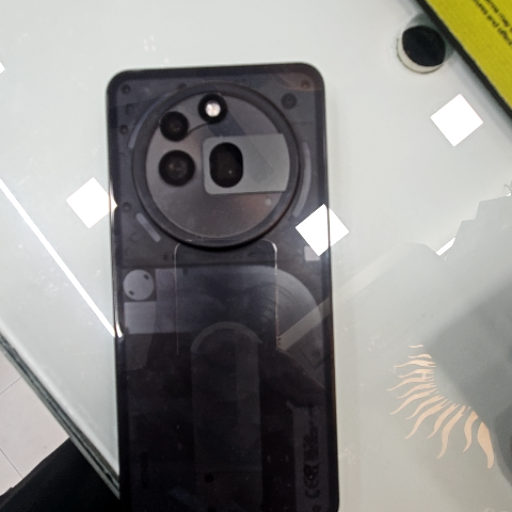 Nothing phone-https://media.vyaparify.com/vcards/products/437660/product_1764761330_69301ef27cc2a.png Image