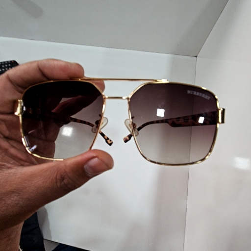 Sunglass-https://media.vyaparify.com/vcards/products/442775/product_1765020356_693412c4c21eb.png Image