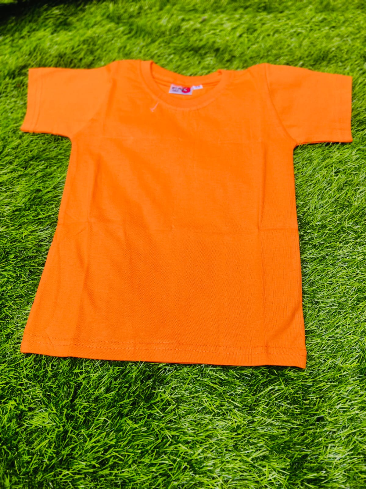  Kids' T-Shirt in Mumbai: Bright Orange Playful Comfort FASHION HOUSE NX Shop No. 06, Gupta Bhuvan, Opp. Mulund Railway Station, Mulund West, Mumbai - 400 080