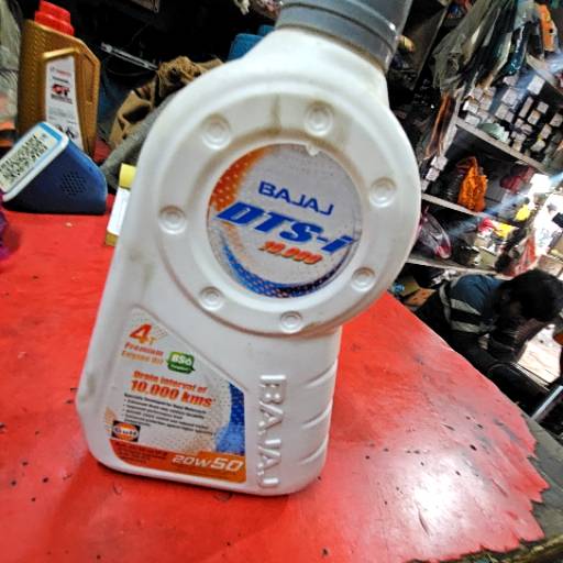 Bajaj Genuine Engine Oil - Enhances Engine Performance-https://media.vyaparify.com/vcards/products/458784/product_1765978686_6942b23ed3bb5.png Image