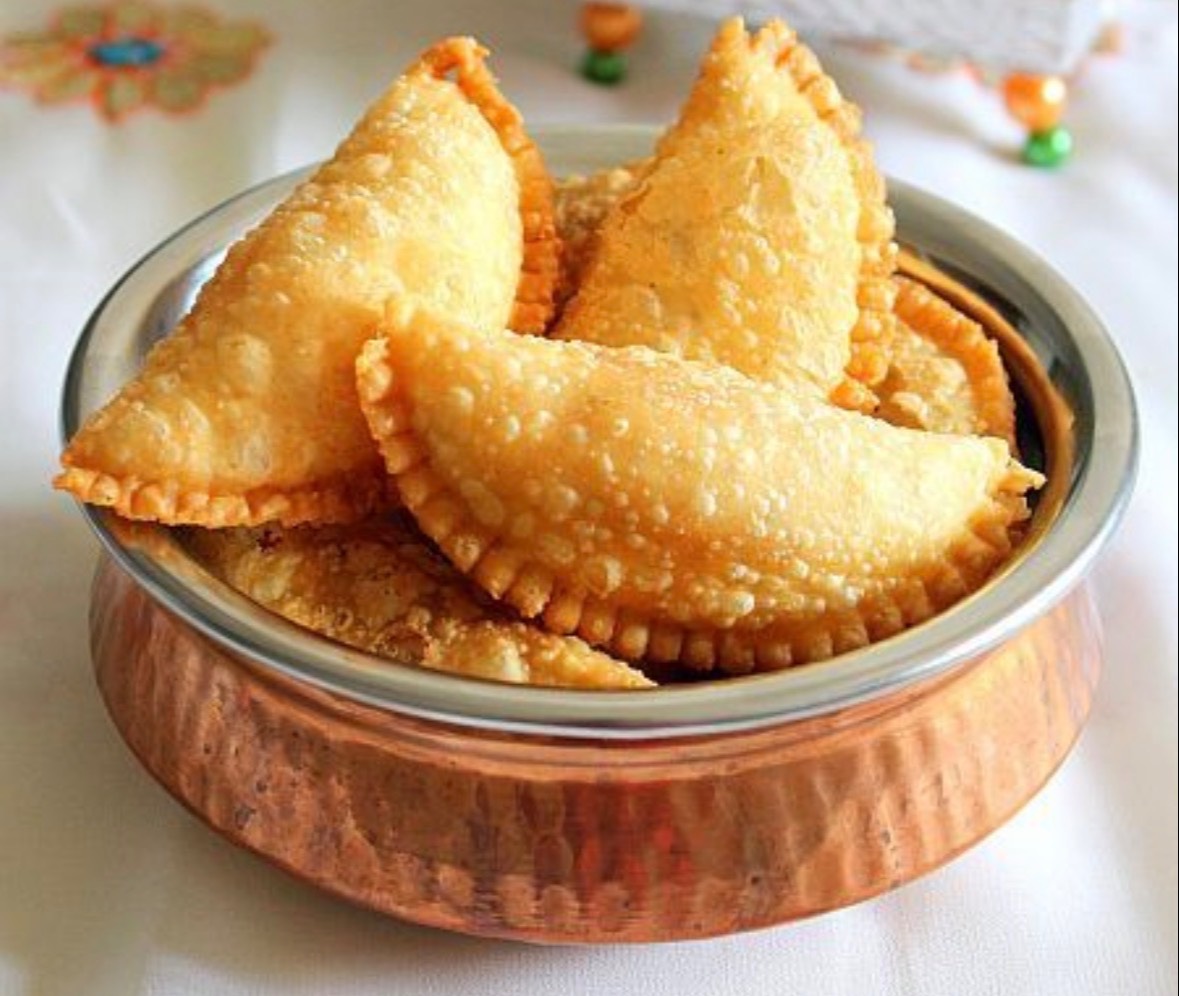 Karanji (Gujiya) in Ongole: Deep Fried Sweet Dumplings with Coconut and Nuts-https://media.vyaparify.com/vcards/products/480786/product_1767870064_695f8e70eb54b.png Image