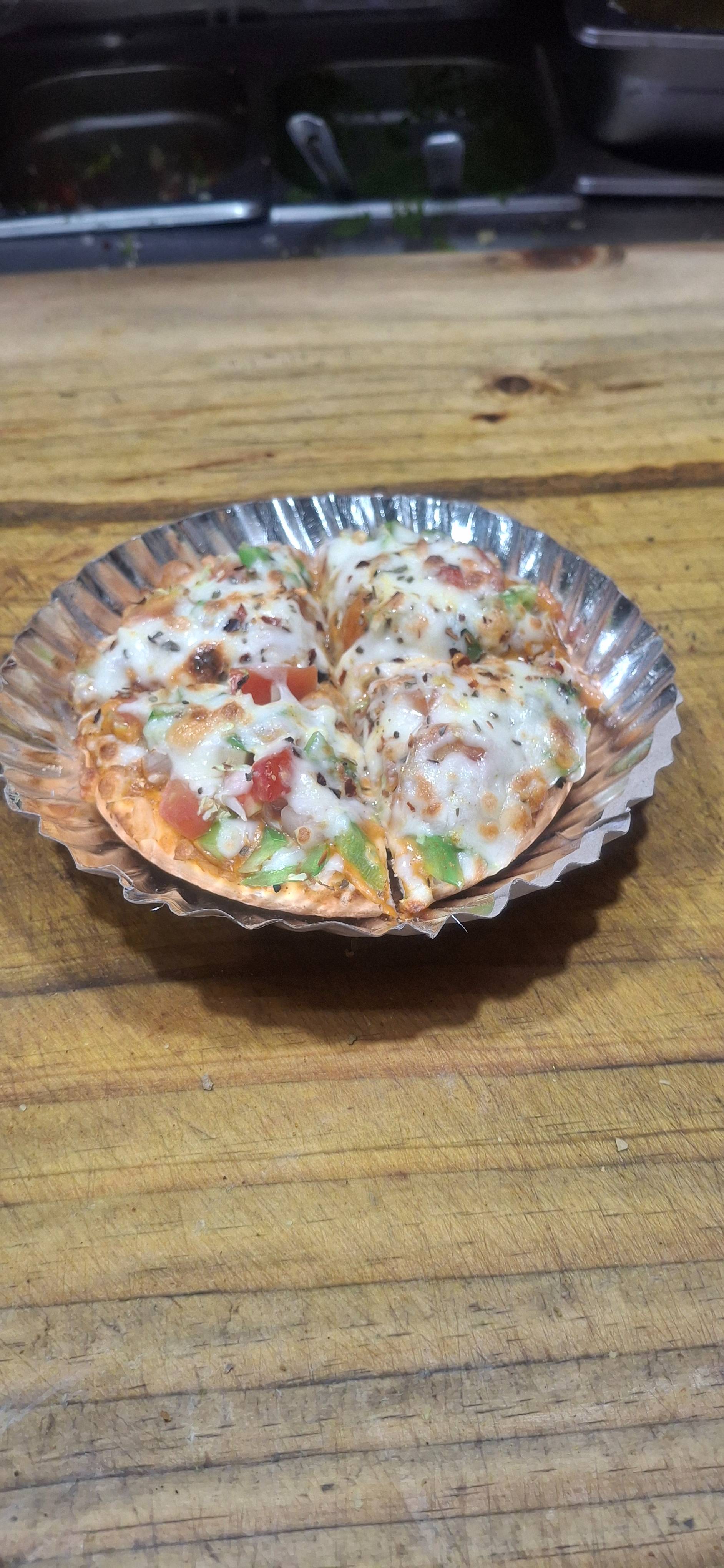 Pizza/Vegetarian Cheese Pizza in Surat - Deliciously Cheesy-https://media.vyaparify.com/vcards/products/485049/product_1768303192_69662a5863ac9.png Image