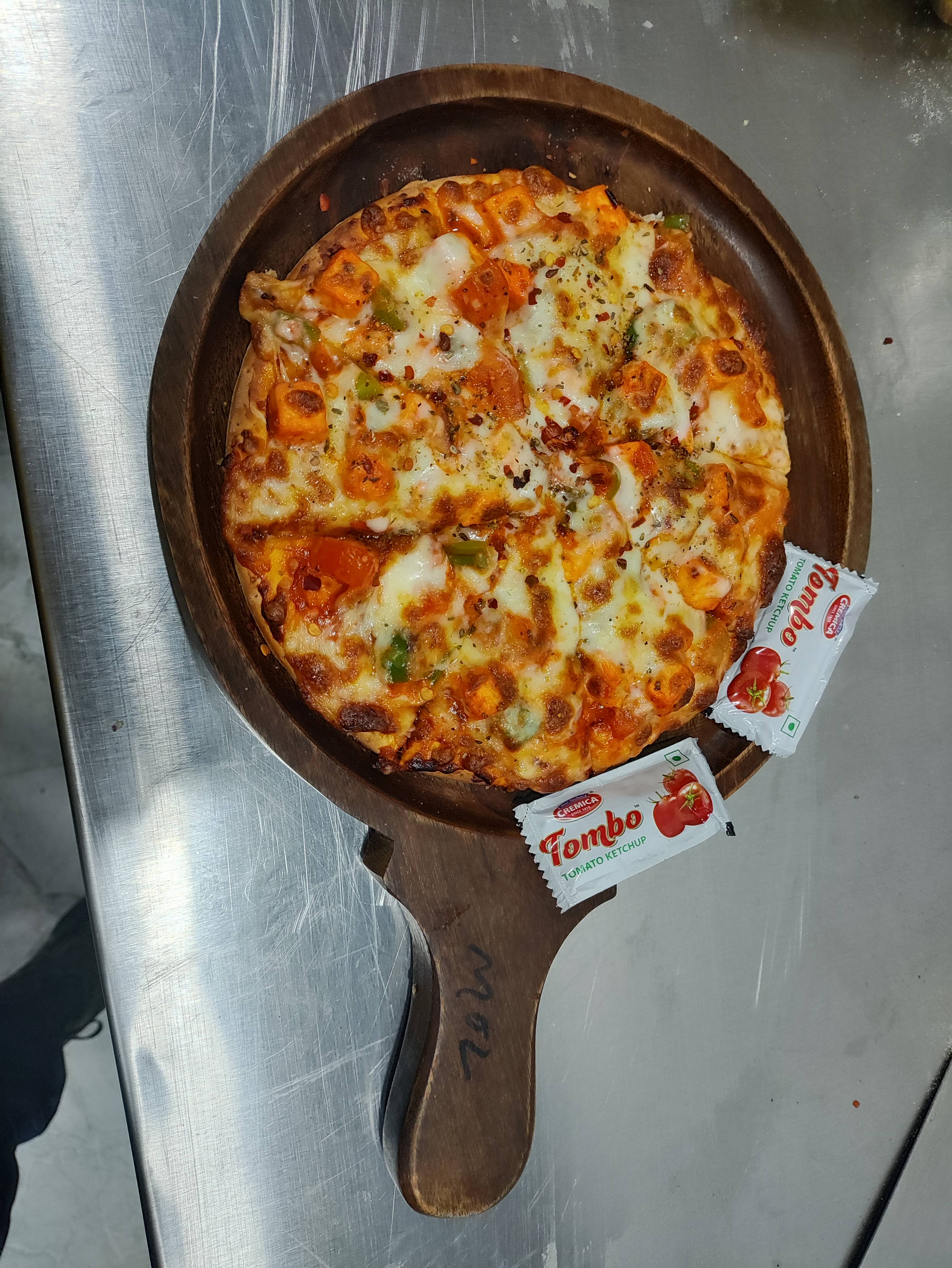 Cheese Veg Pizza in JNV Gurudwara: A Mouthwatering Delight for Cheese Lovers-https://media.vyaparify.com/vcards/products/489427/product_1768639844_696b4d64a90f9.png Image