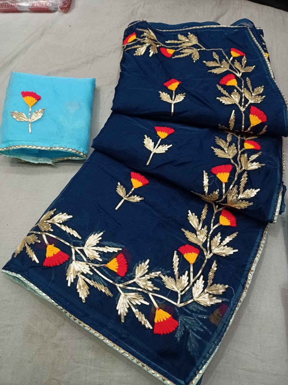 Embroidered Navy Blue Saree in Gwalior - Vibrant Floral Design-https://media.vyaparify.com/vcards/products/489594/product_1768645511_696b6387c004b.png Image
