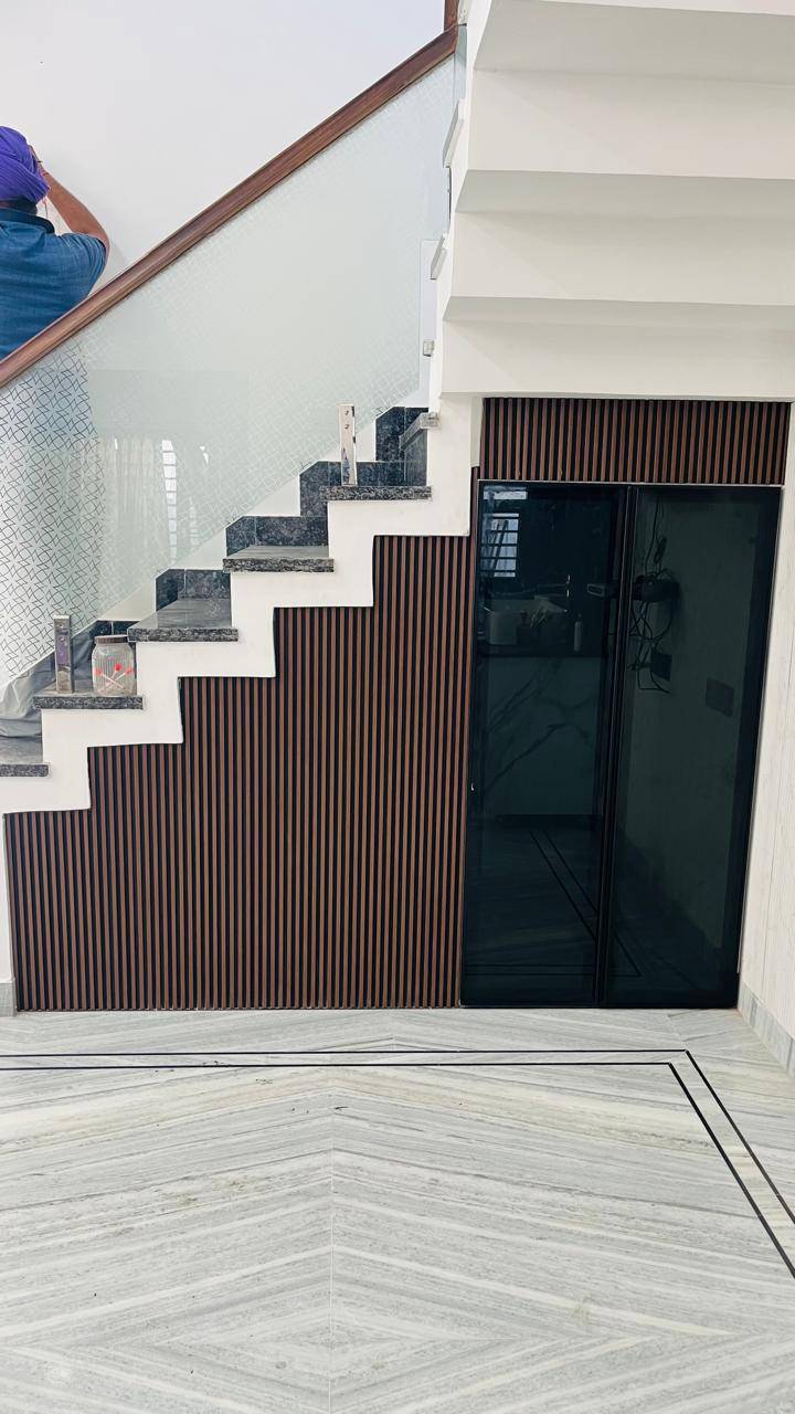 N B GLASS TRADERS Modern Staircase with Glass Railing in Aujala - Sleek Home Enhancement - Image 1
