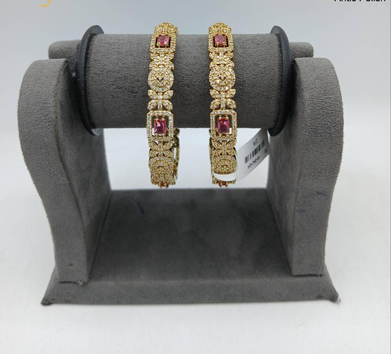 Usha Arts Shop Gold Bangles in Malad West: Elegant Ruby Embellishments