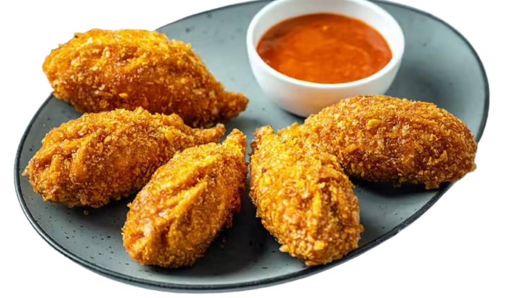 Delicious Momos in Rangia: Crispy Momos with Cheese, Chicken, and Veg Fillings -  - Buy Online at AAHAR HOTEL AND RESTAURANT