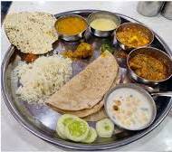  Indian Cuisine Bhojan Thali in Veraval - Traditional Lunch Platter UMA RESTAURANT UMA ATITHI BHAWAN SOMNATH ROAD MITHAPUR ROAD HIREN RIVER BANK VERAVAL GIR SOMNATH LANDMARK Opp Hiren River Bank