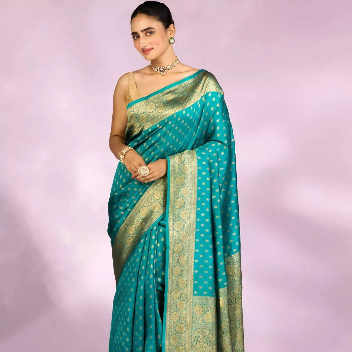 Elegant Teal Blue Banarasi Silk Saree -  - Buy Online at AMIN NAJMUDDIN LALANI