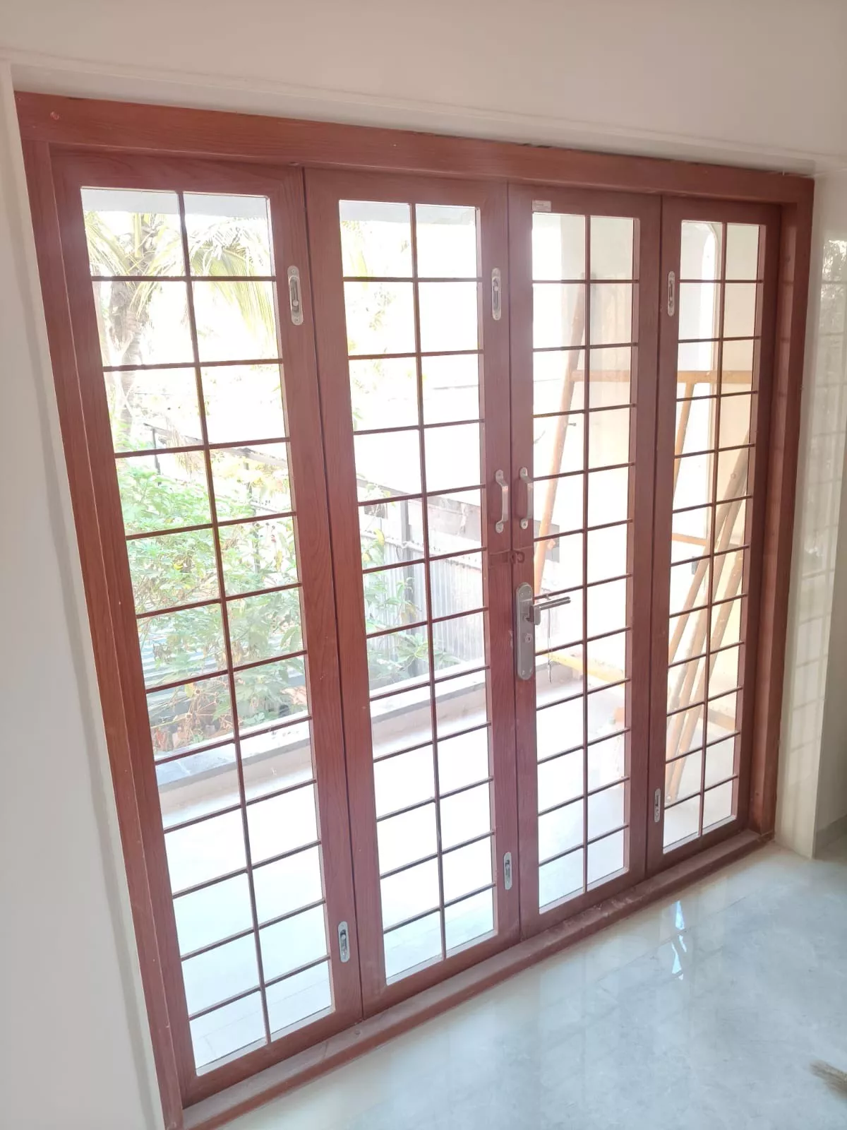  Wooden Sliding French Door in Satara with Grid Design SRJ UPVC WINDOOR S No 54 7 6 Girvi  Road Jadhavwadi  Phaltan Dist Satara