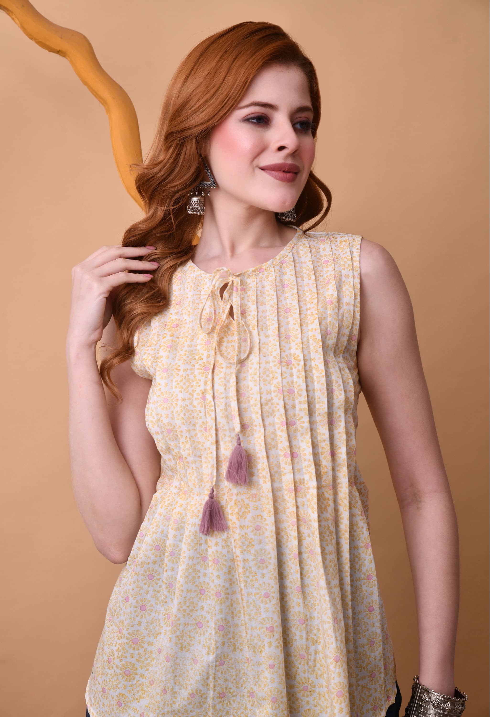 Women's Fashion: Floral Print Sleeveless Tie-Up Neck Pleated Top in Jaipur - Stylish and Comfortable -  - Buy Online at CLICK KART