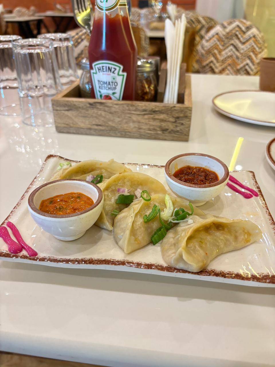 Vegetable Momos in Jaipur: Flavorful Steamed Snack -  - Buy Online at THE FORTRESS CAFE AND MULTI CUISINE