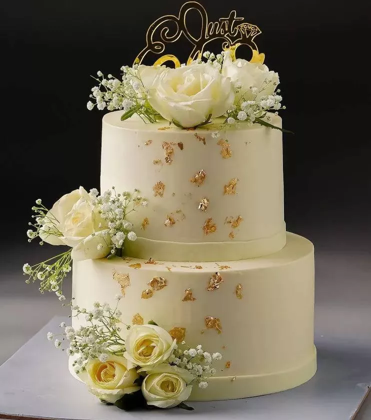 Celebration Cake: Elegant Two-Tier in Gurdaspur with Floral and Gold Leaf Decoration -  - Buy Online at TWINS BROTHER SALON