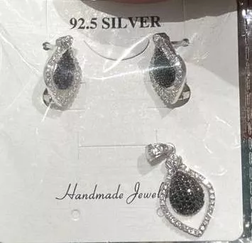  Silver Jewelry: Elegant 92.5 Silver Earrings and Pendant Set in Rajkot - Timeless Beauty R K JEWELLERS GROUND FLOOR SHOP  NO 5 NAKSHATRA 7  RAIYA ROAD NEAR RAIYA CHOKDI CHANDAN PARK RAJKOT RAJKOT GUJARAT  NO 5 NAKSHATRA 7  RAIYA ROAD NEAR RAIYA CHOKDI CHANDAN PARK RAJKOT RAJKOT GUJARAT