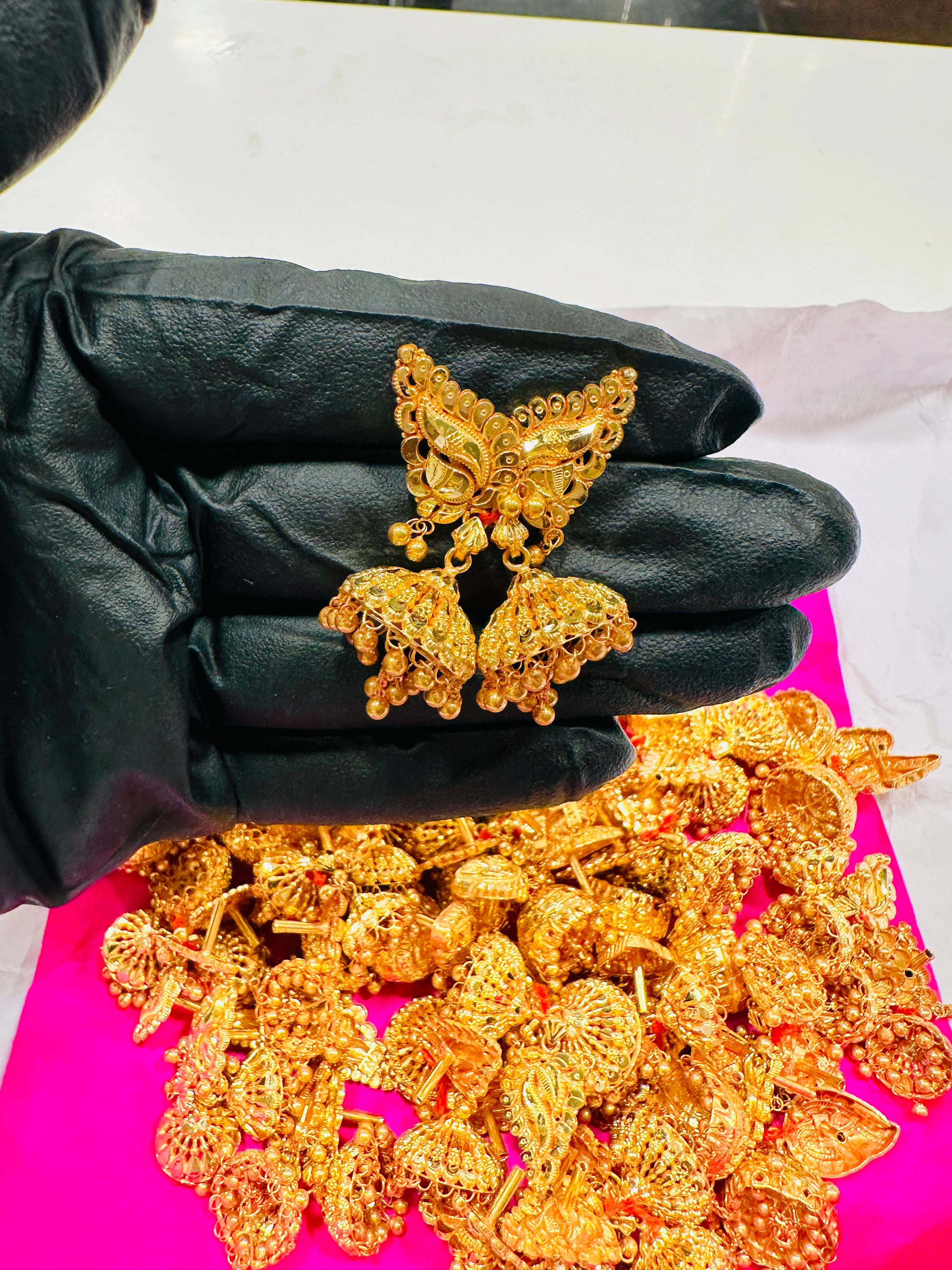 Jewelry/Traditional Gold-Plated Jhumka Earrings in PVR: Exquisite Craftsmanship -  - Buy Online at ZIVARA JEWELLERY