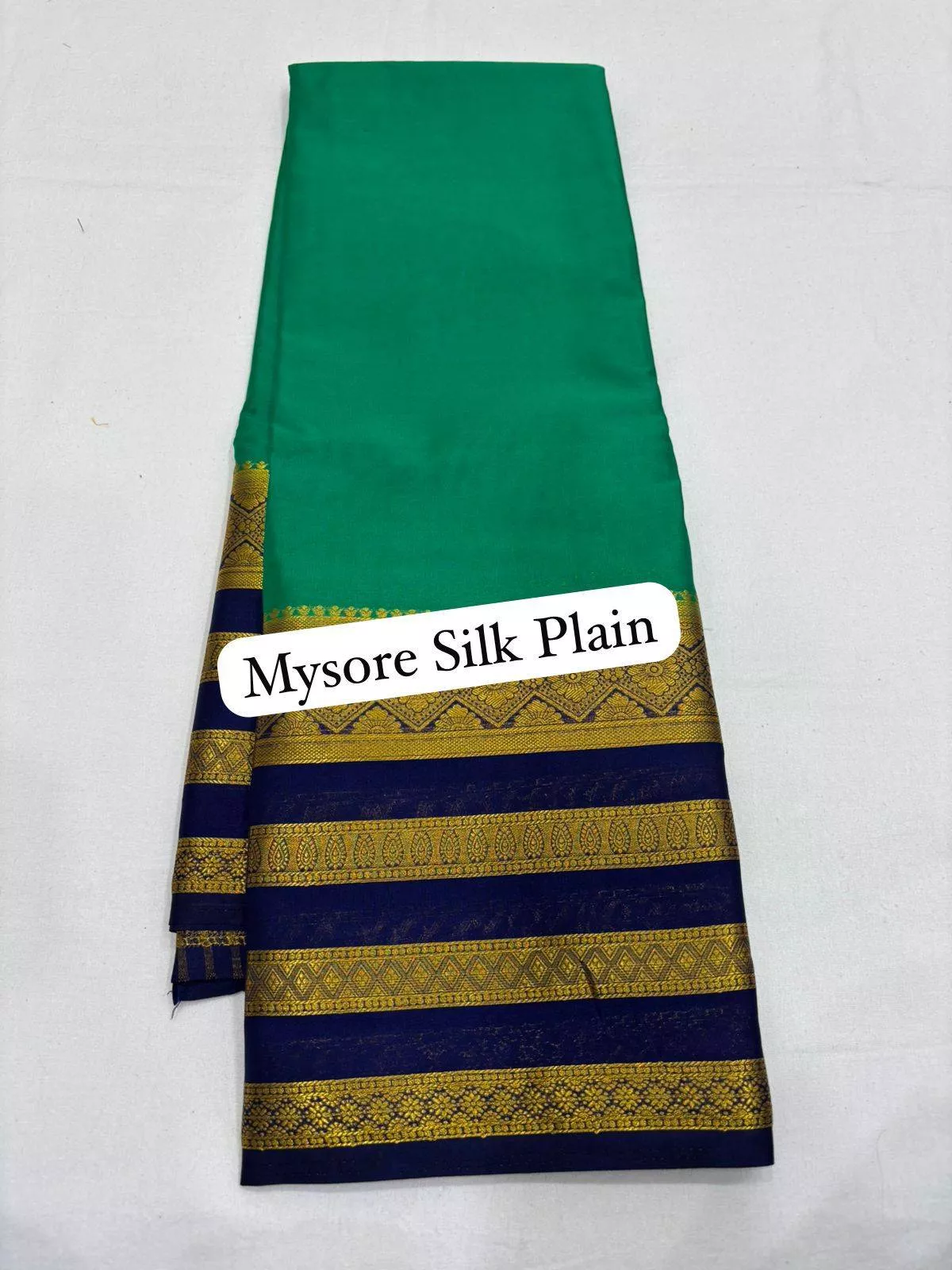 Mysore Silk Saree in Sri Ramachandra: Elegant Green Silk with Gold Zari Border -  - Buy Online at SRI RAMACHANDRA TEXTILES