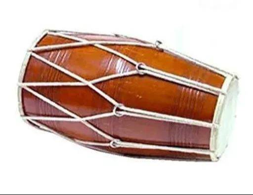 Rope Dholak percussion instrument featuring a sturdy design and vibrant colors, displayed in a music shop in Meerut. - Image 1