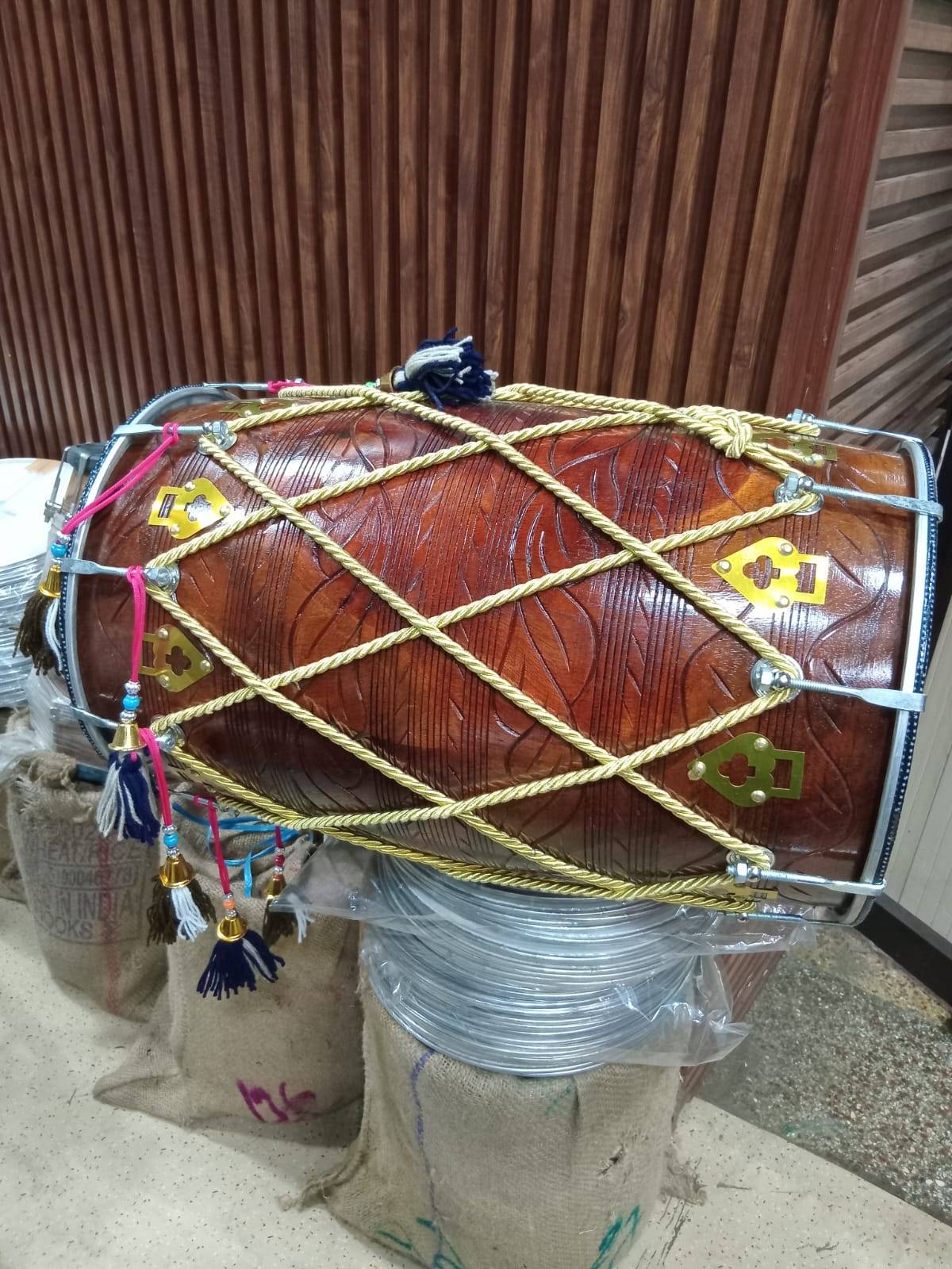 Punjabi Bhangra Dhol designed for lively performances, featuring vibrant colors and a sturdy build, available at MELODY MAKER - Image 1