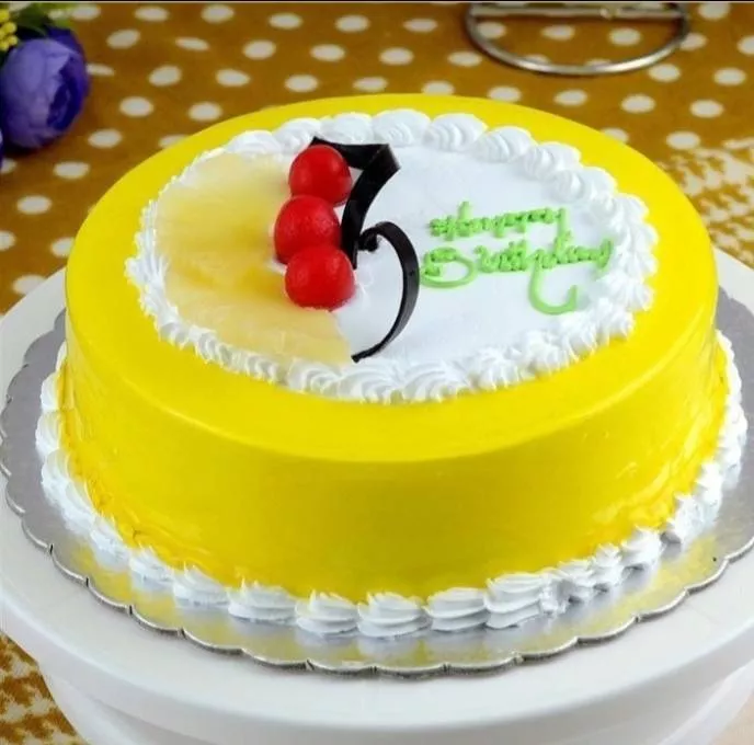 Celebration Cakes: Pineapple Celebration Cake in G F PLOT NO 35 SHOP NO 2 KH NO 6 5 2 SATYAM VIHAR GALI NO 6 CHANCHAL PARK NEAR SHAKTI with Creamy Delight -  - Buy Online at SANKALP COOL ZONE