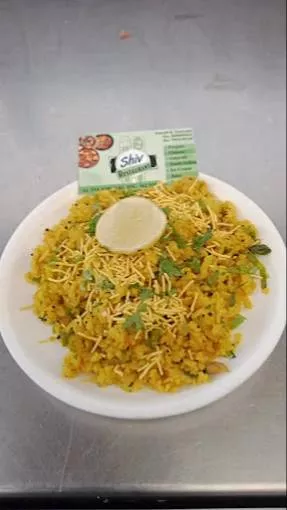 Poha with Sev Garnish in Diu - Delicious Street Food Experience -  - Buy Online at SHIV FAST FOOD AND RESTAURANT