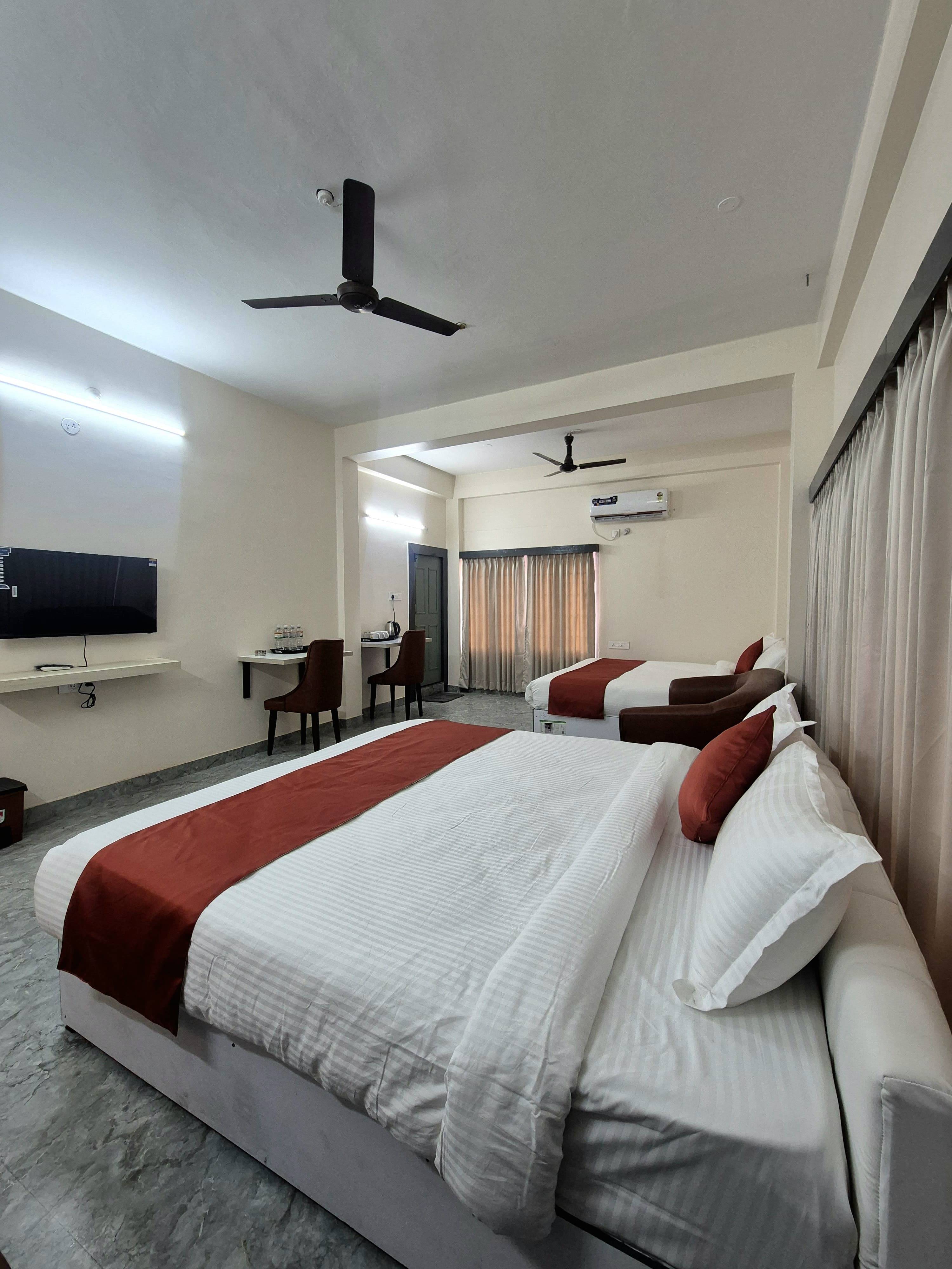 Deluxe Family Hotel Room With Garden View - Image 1