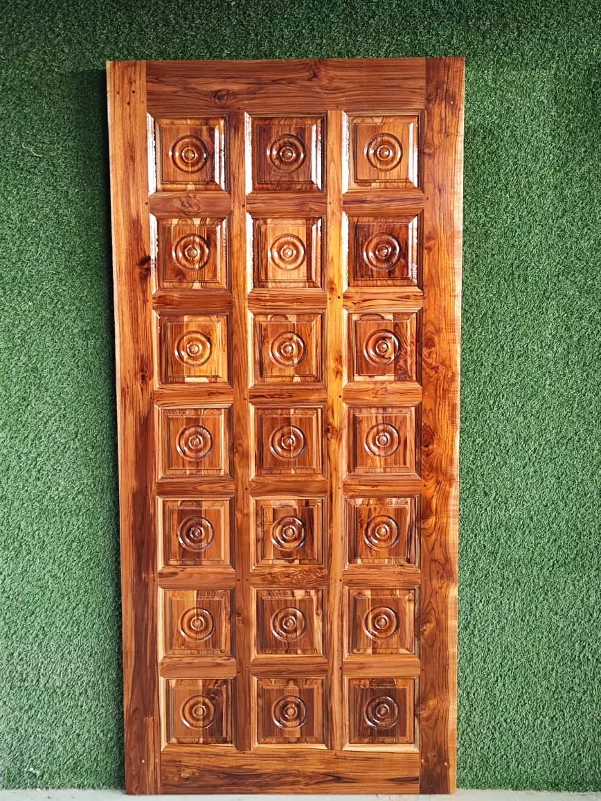 Elegant Segun wooden door crafted from pure Segun wood, showcasing rich texture and finish, available in Jorhat.