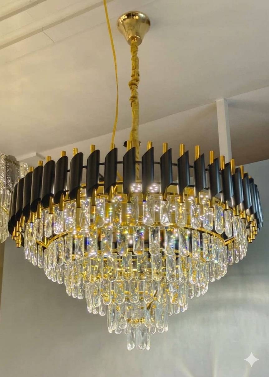 Black Mamba Chandelier featuring an elegant blend of black and gold hues with integrated Bluetooth speakers, suitable for mod