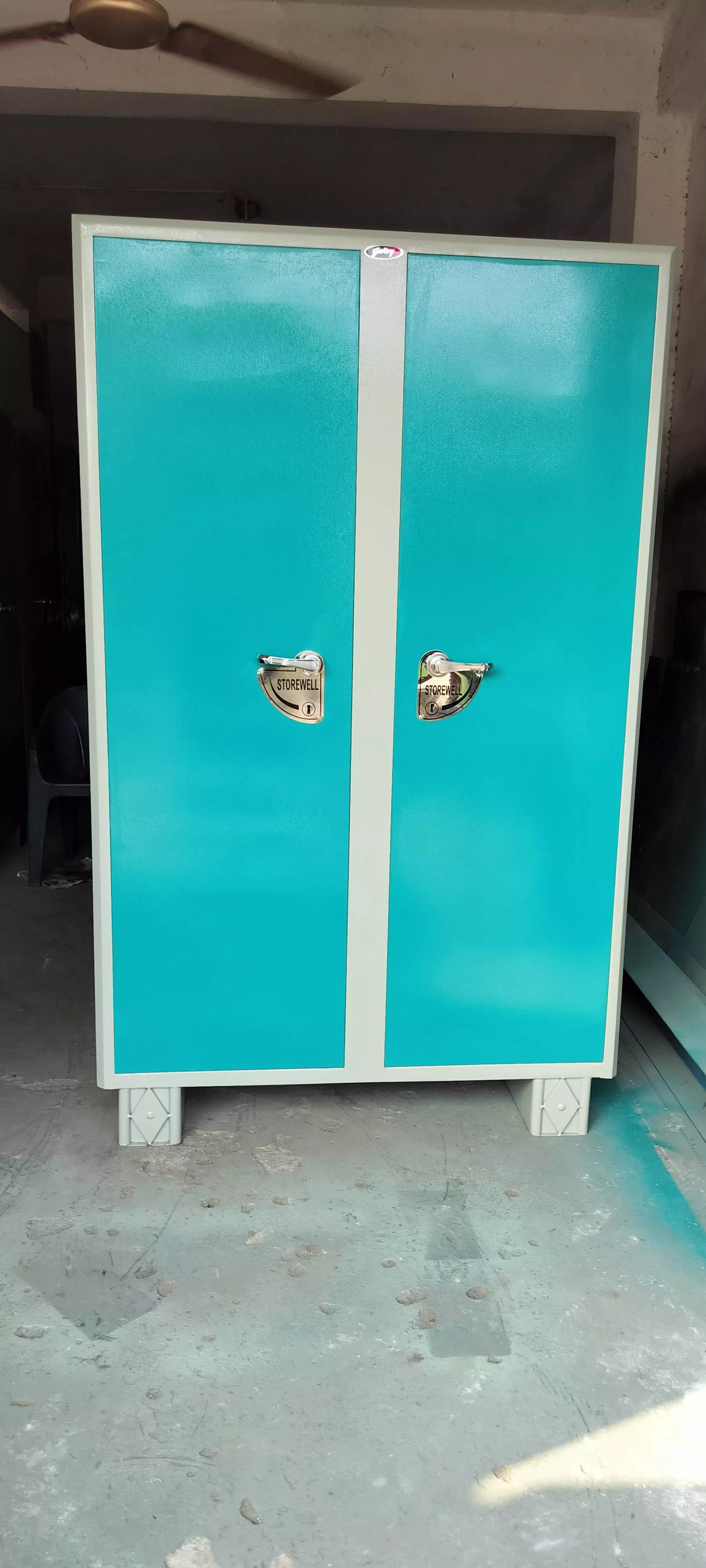 Spacious steel storage cabinet with multiple shelves in PALWANCHA, ideal for home and office organization